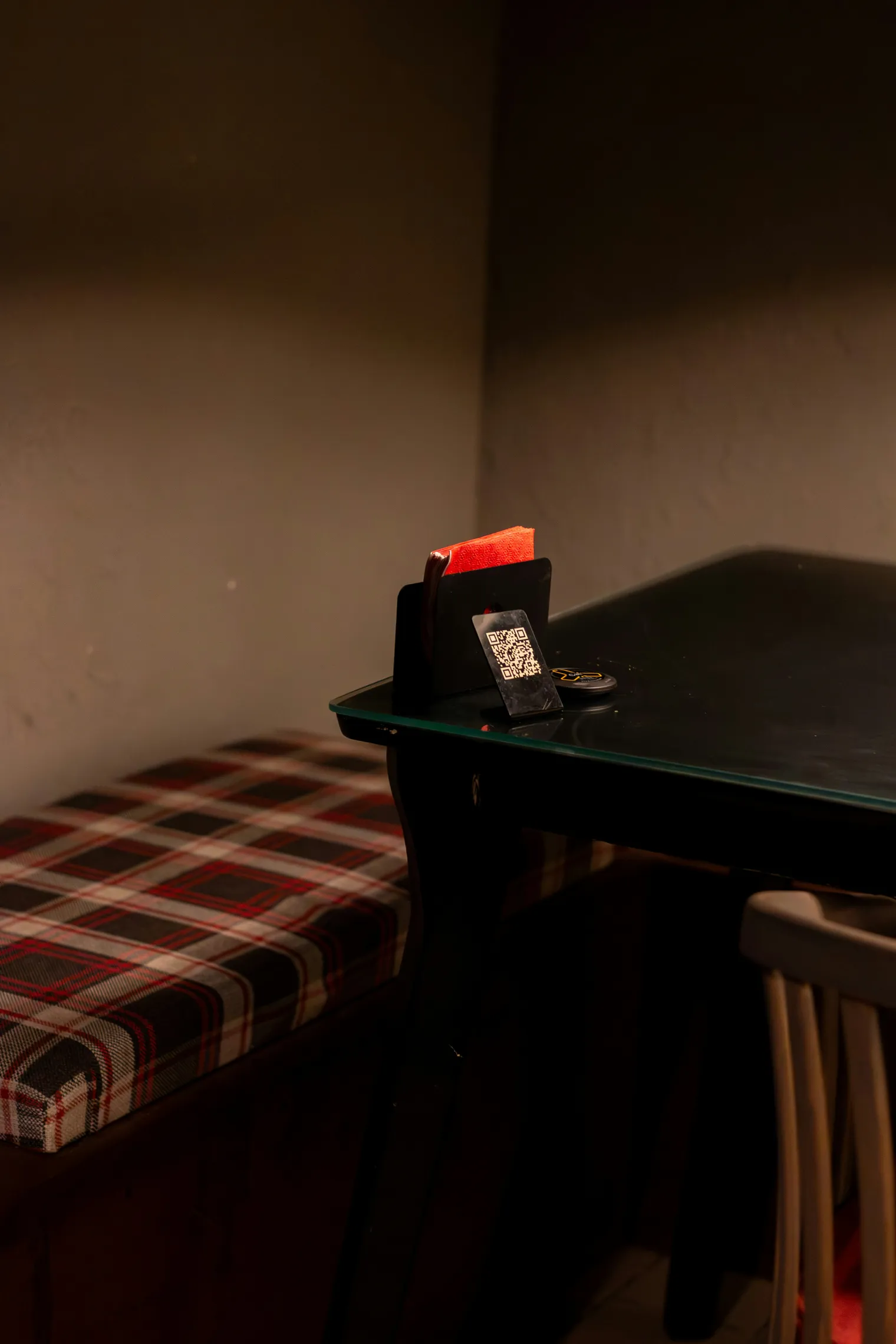 A QR code table stand on a restaurant table